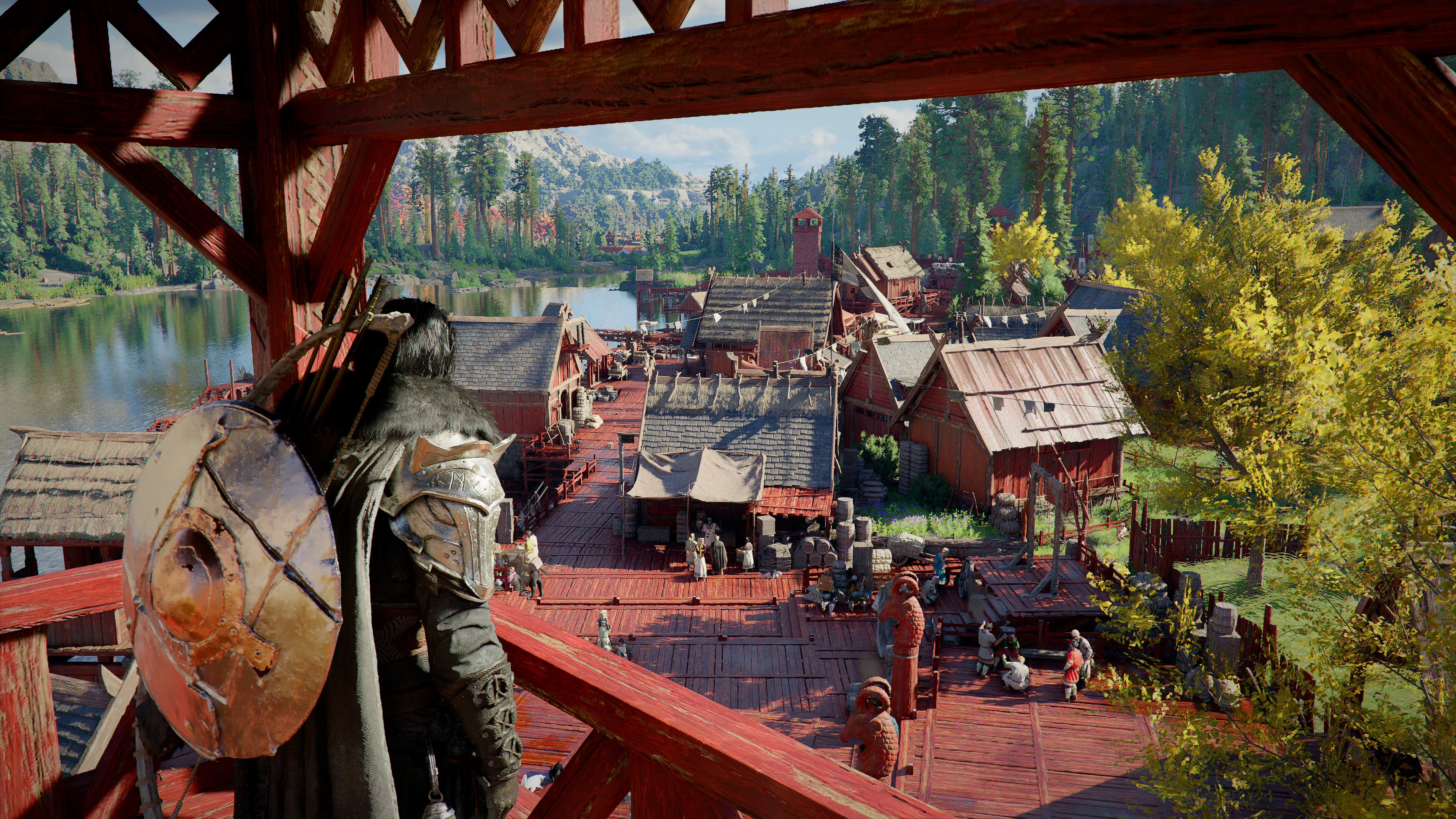 An adventurer overlooking a riverside settlement